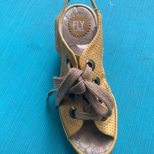 Fly London tie up shoes..yellow